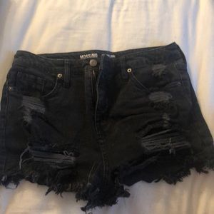 black distressed shorts